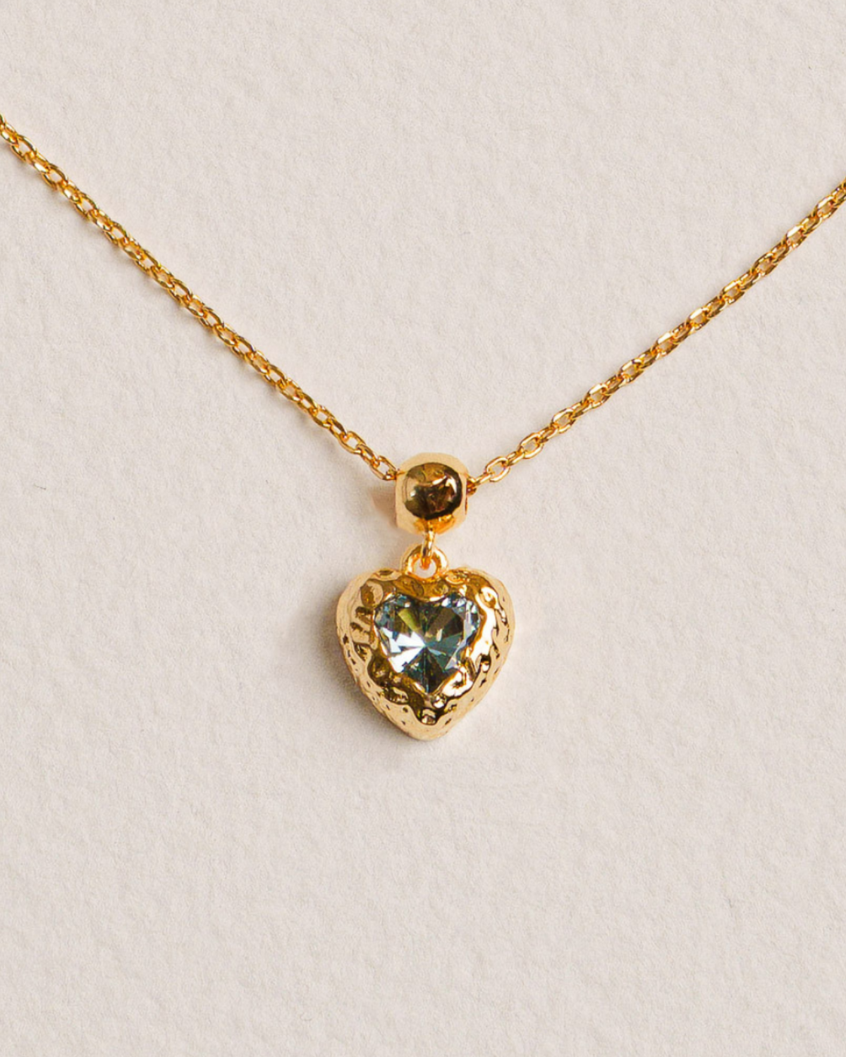 18K Gold-plated necklace with a heart-shaped pendant featuring a blue gemstone