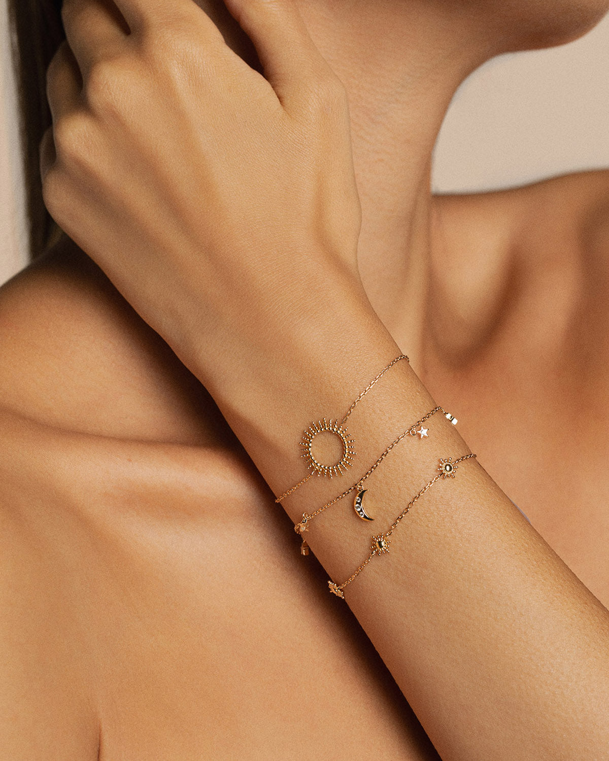 Three 18k gold-plated bracelets