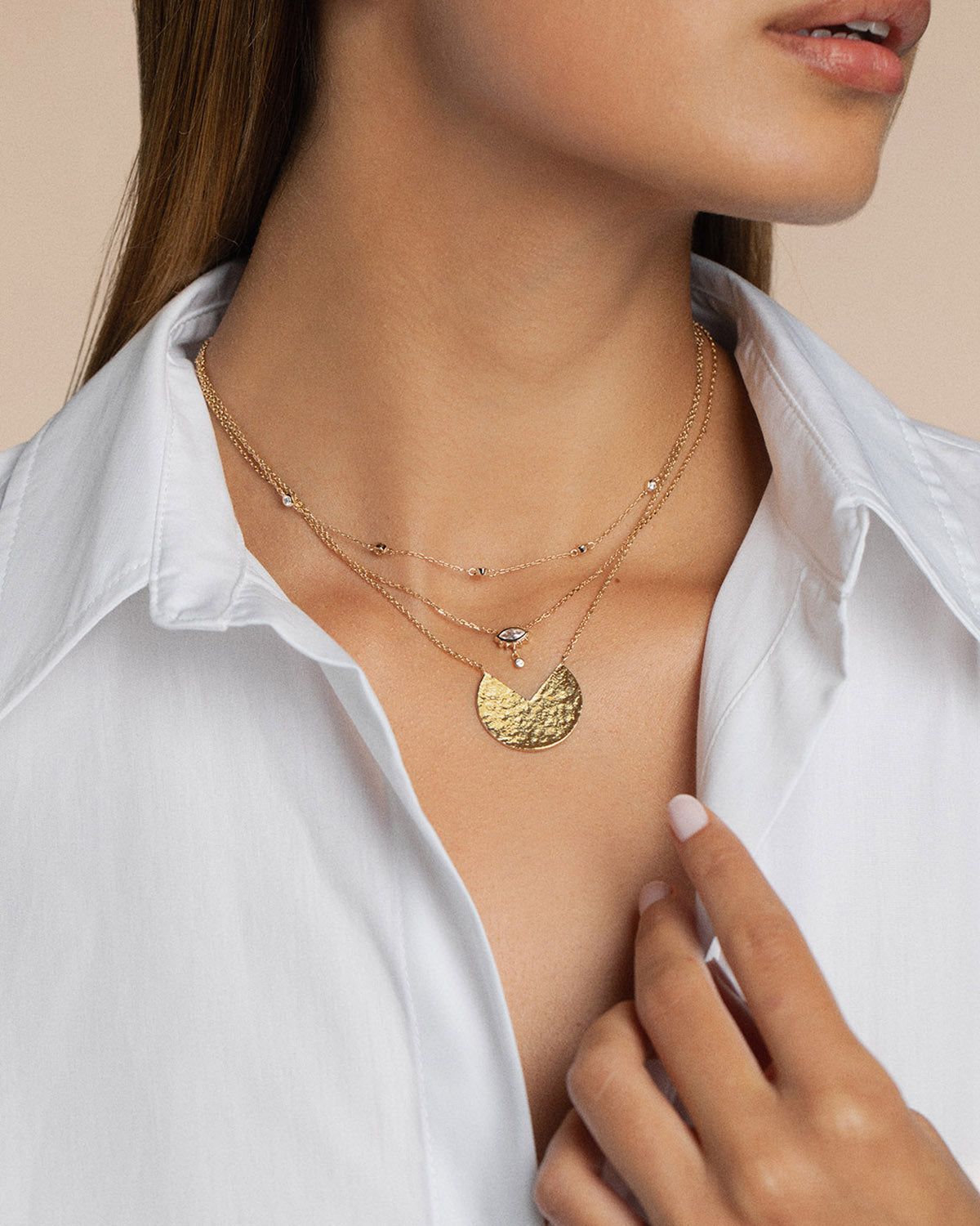 Three 18k gold-plated necklaces