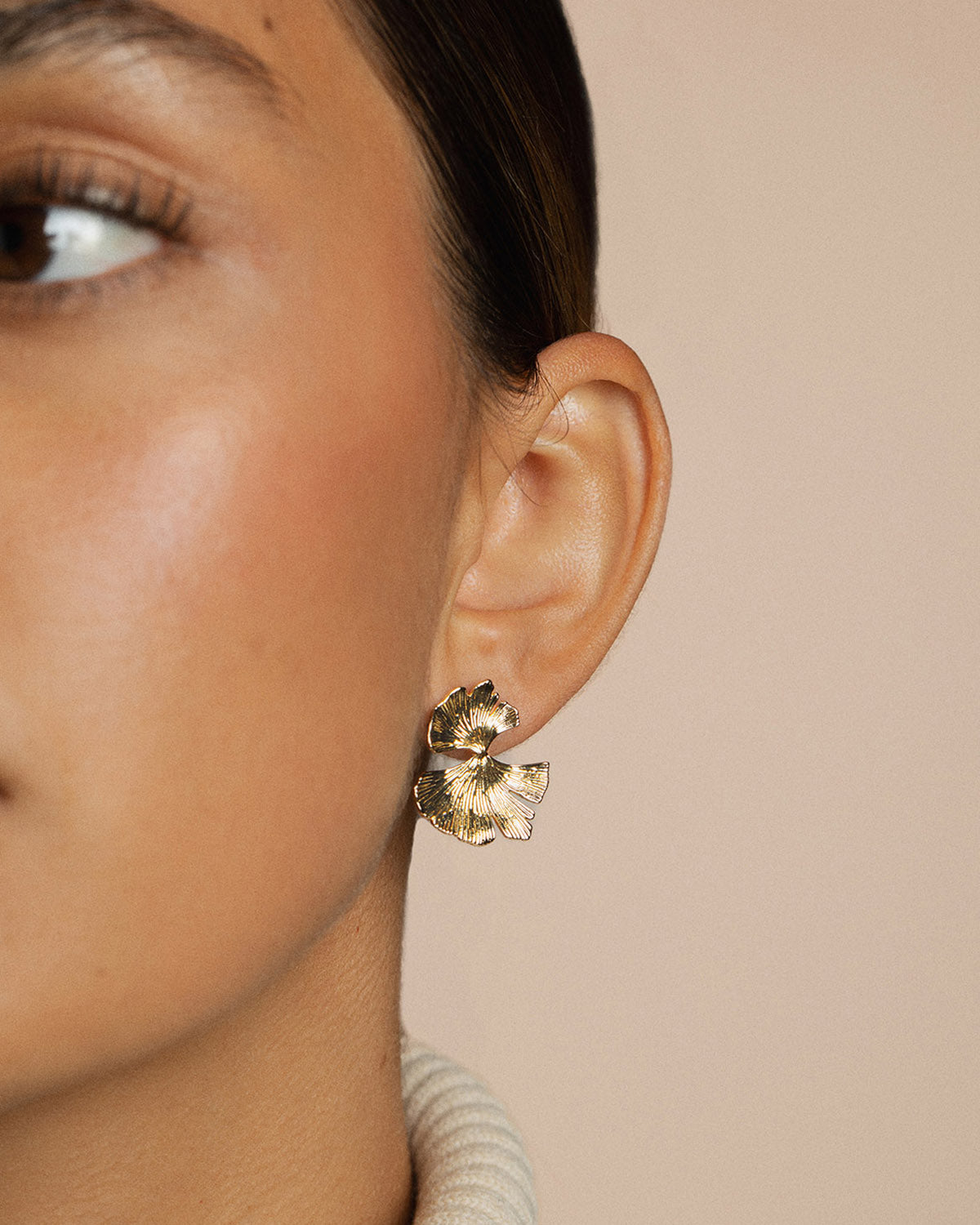 A 18k gold-plated foral earrings representing a flower petal