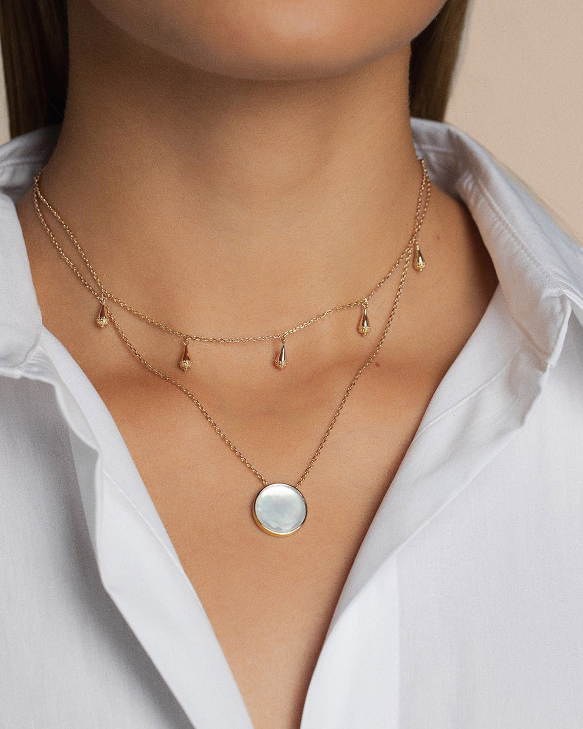 Two 18k gold-plated necklaces