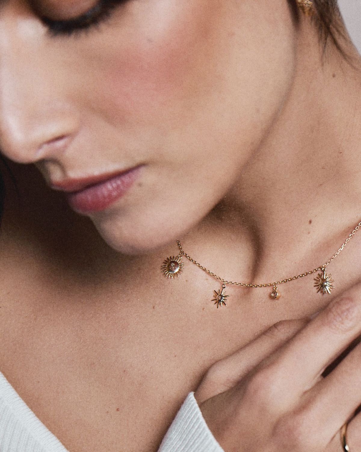 A 18k gold-plated necklace with sun charms