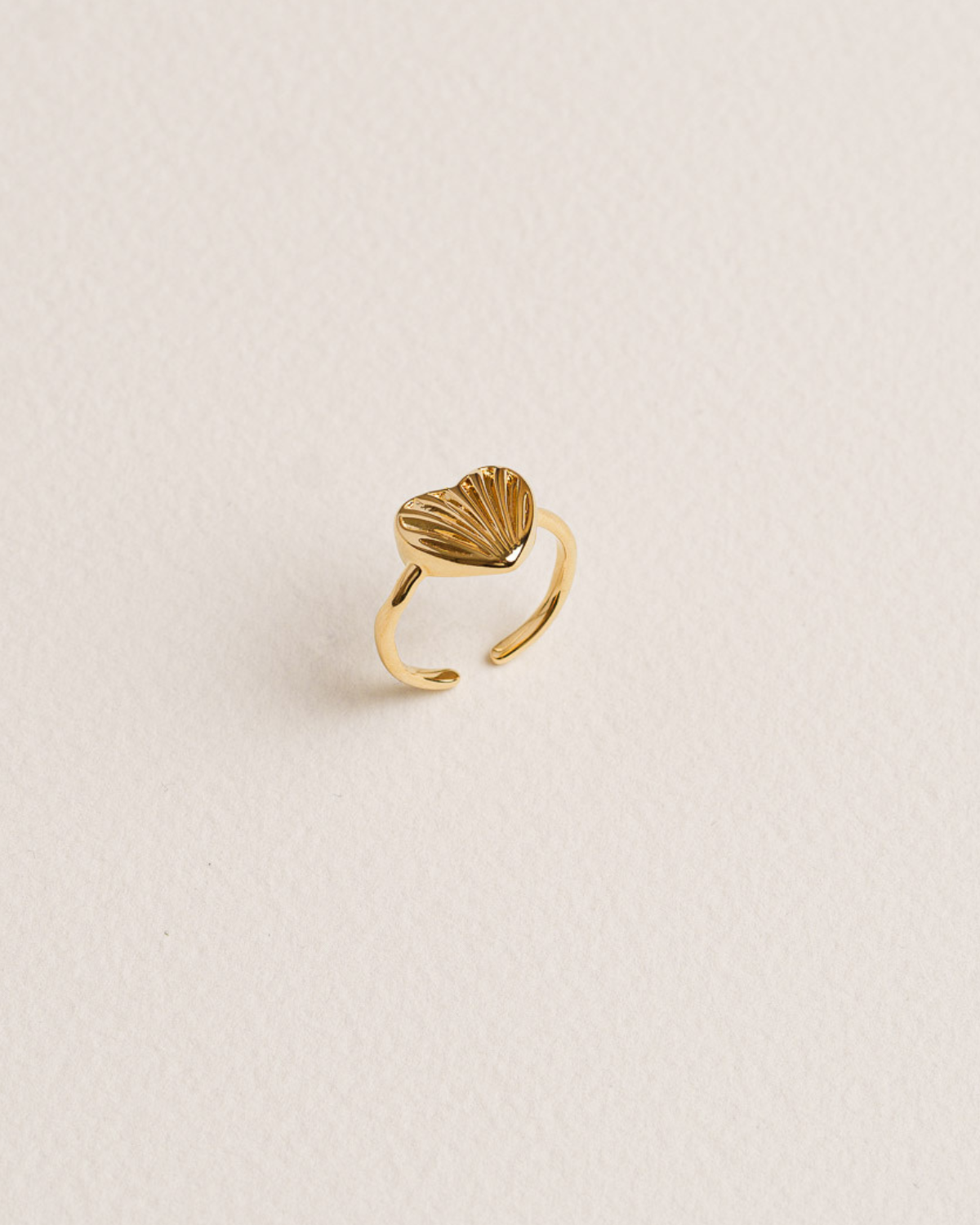 A 18K Gold-plated ring with a simple, organic shape design