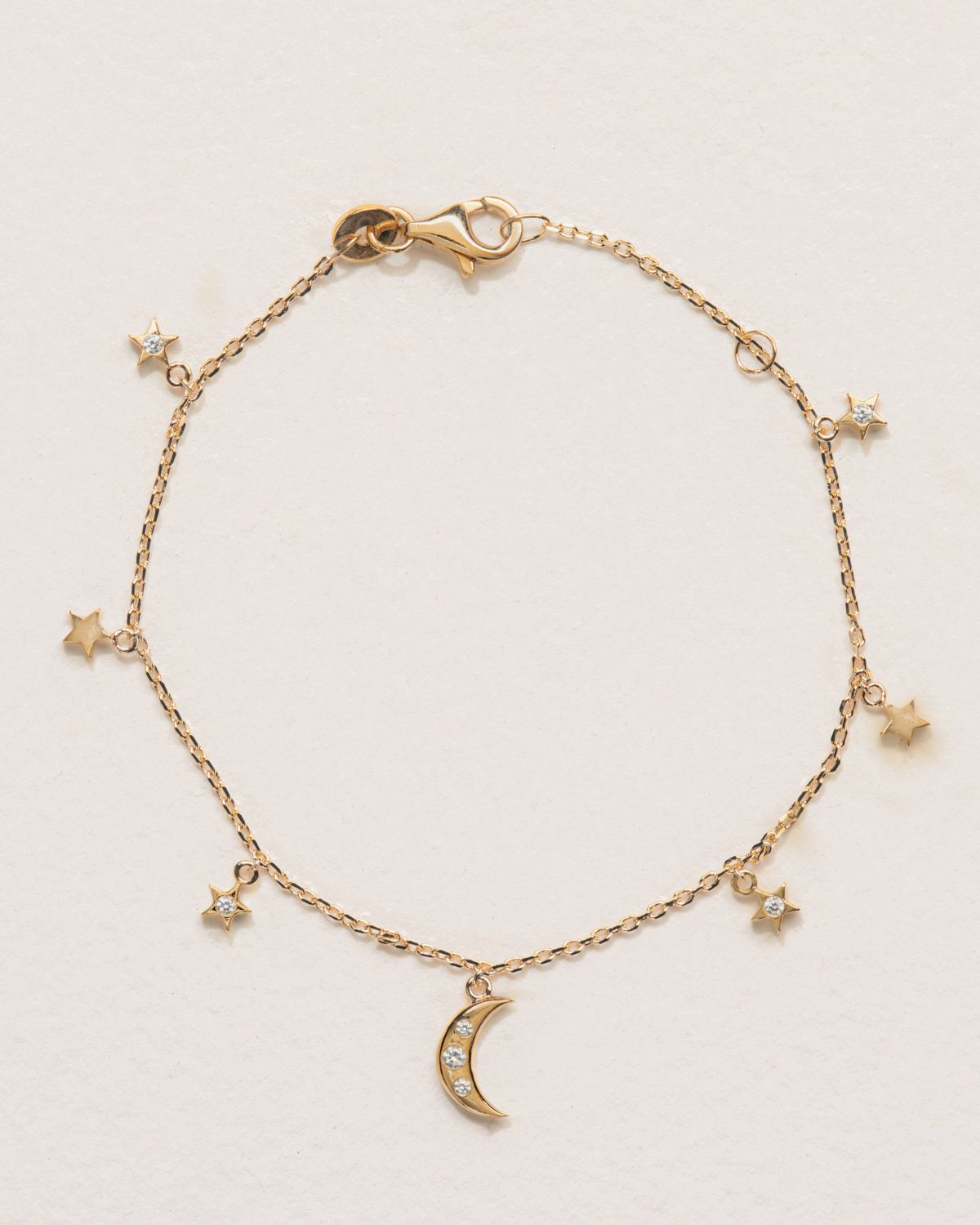 A 18k gold-plated bracelet with stellar charms