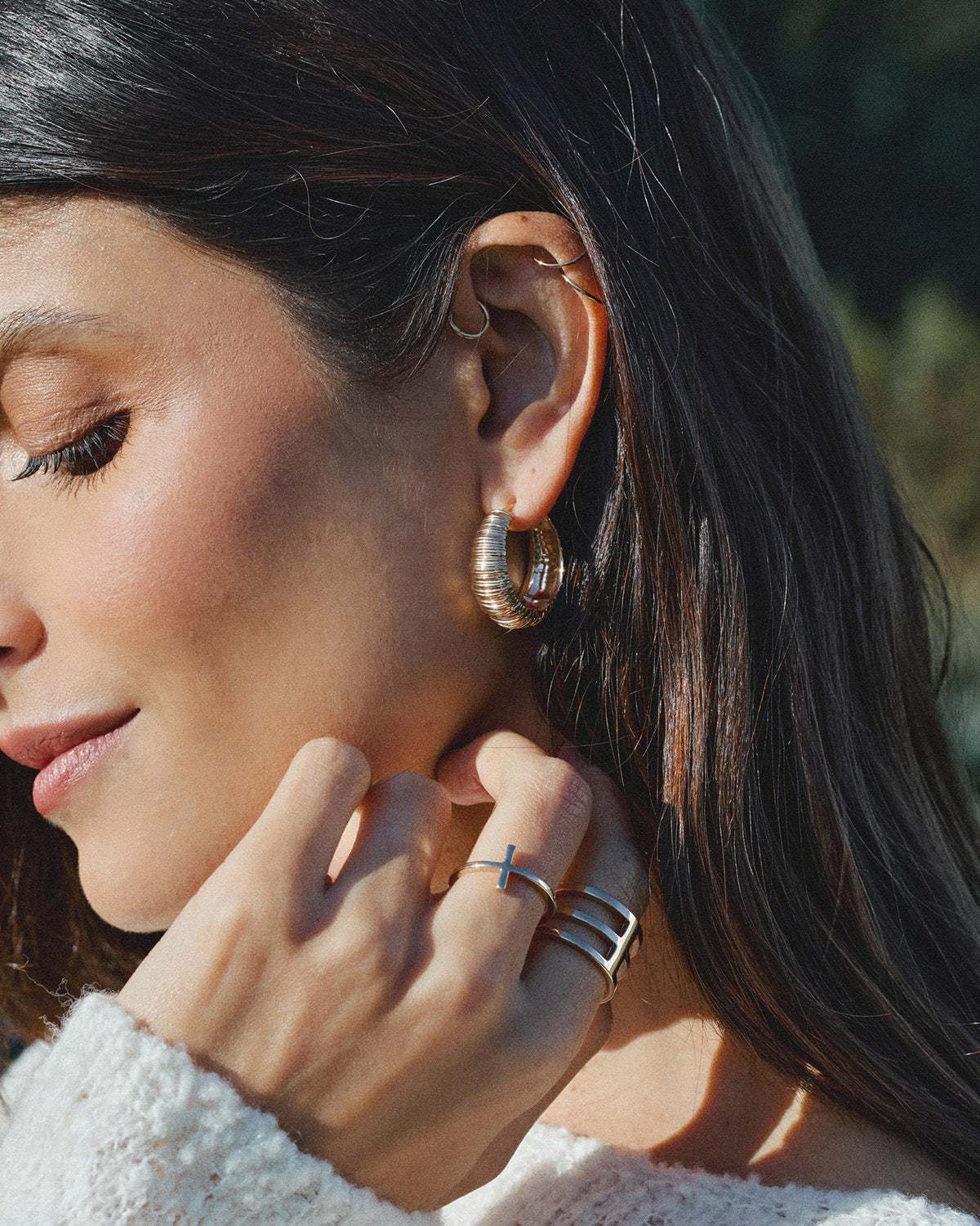 A 18k gold-plated earrigns and rings photo campaign