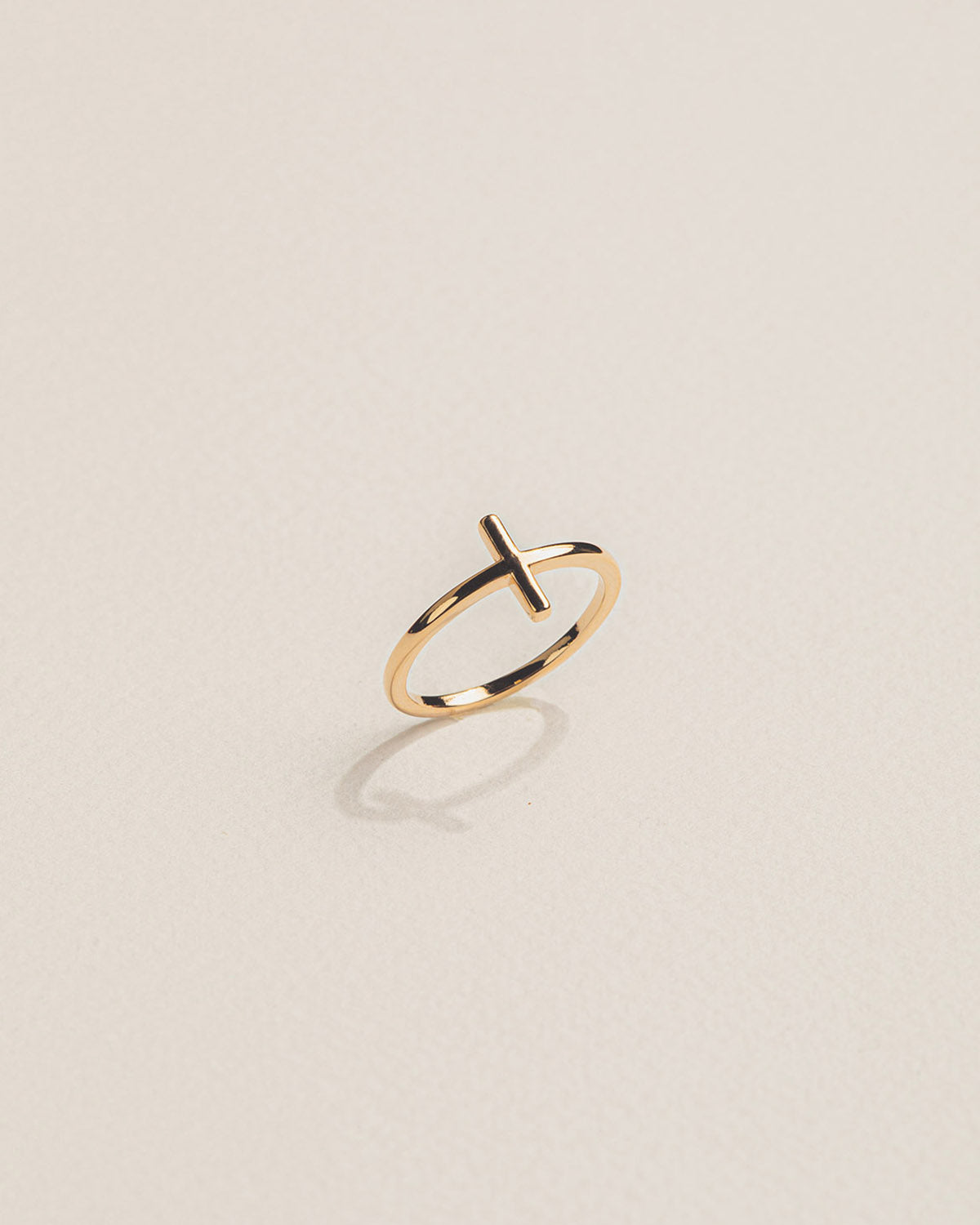 A 18k gold-plated minimalist ring with a simple design.