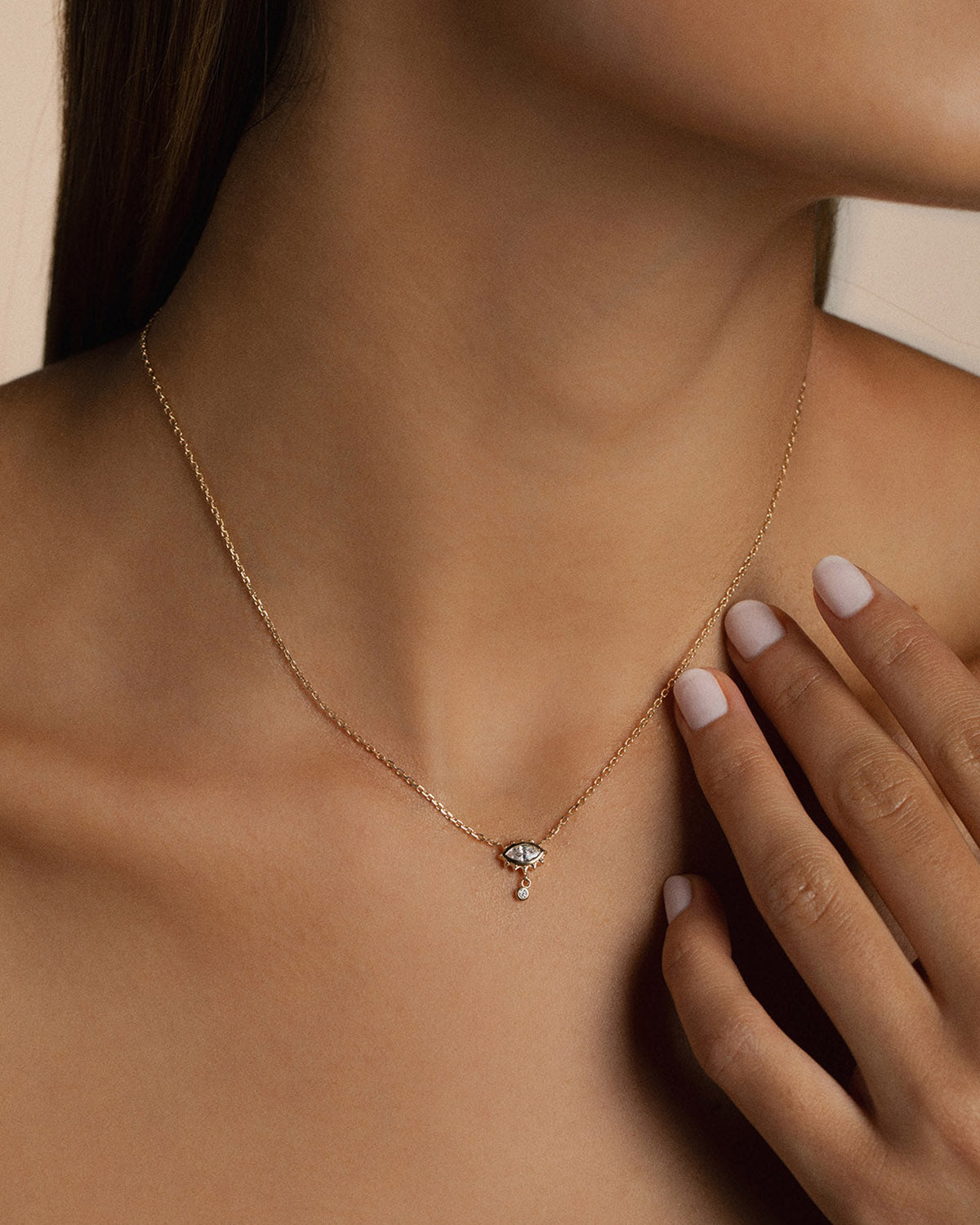 A 18k gold-plated zirconia eye necklace