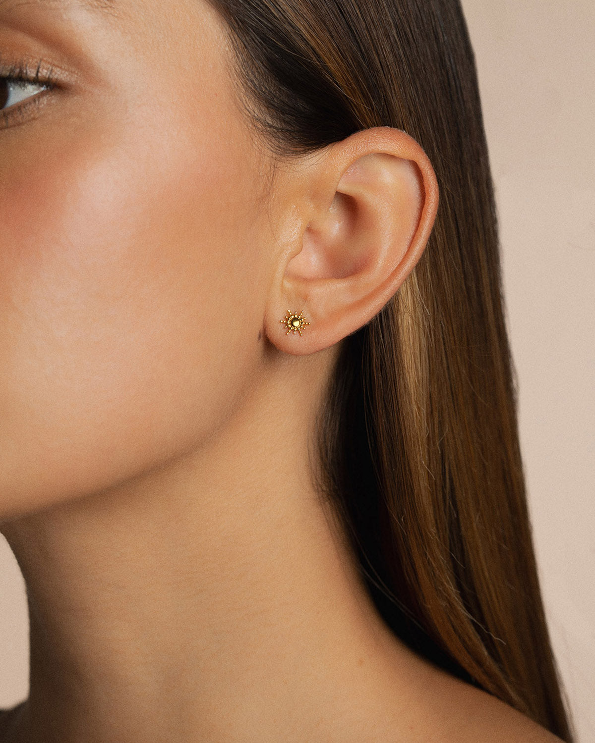 A 18k gold-plated solar ear cuffs