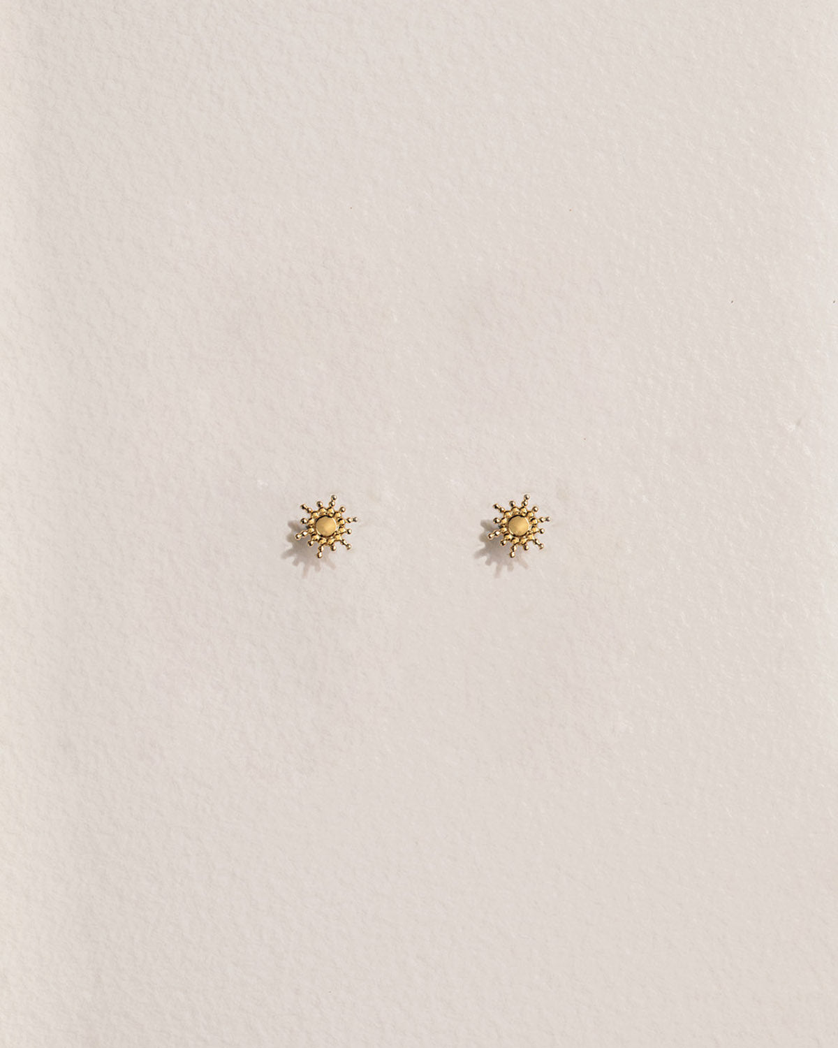 A 18k gold-plated solar ear cuffs